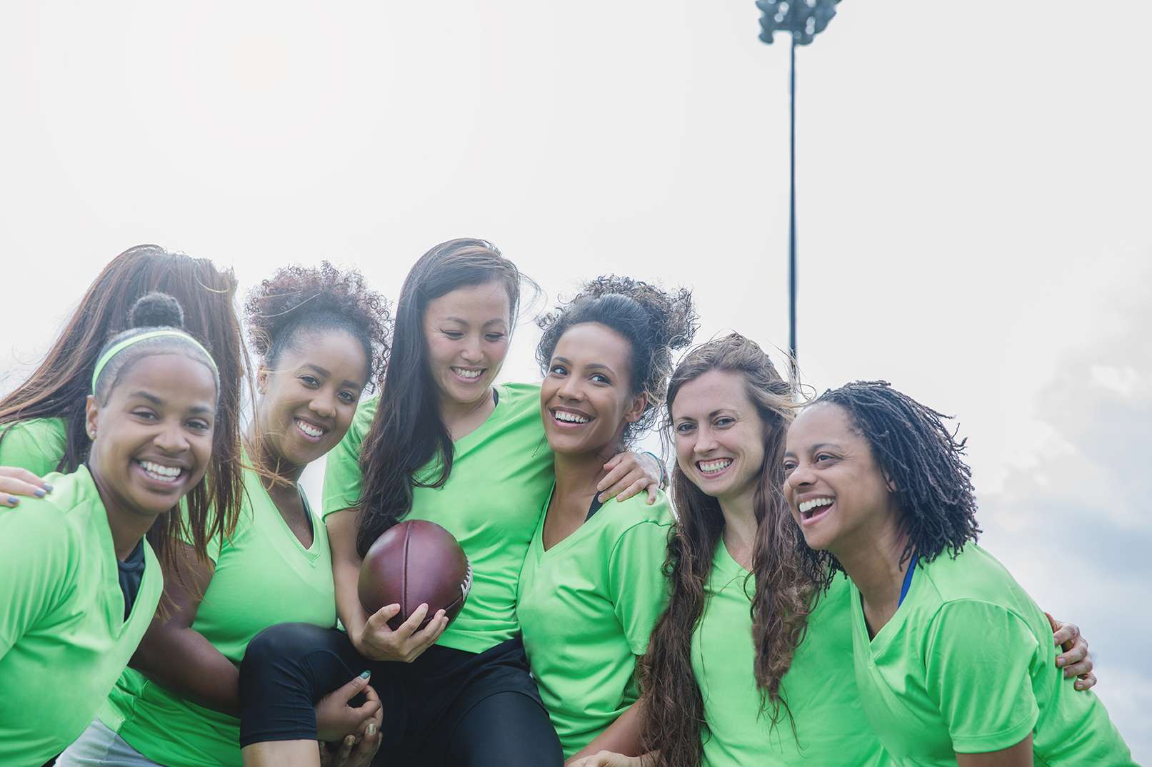young women with football